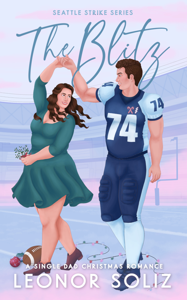 Cover. The two MCs hold hands as if dancing. She holds mistletoe in her hand and christmas lights lay at their feet. They look at each other adoringly and smiling. She wears a green dress and he wears the team's uniform in navy and light blue.